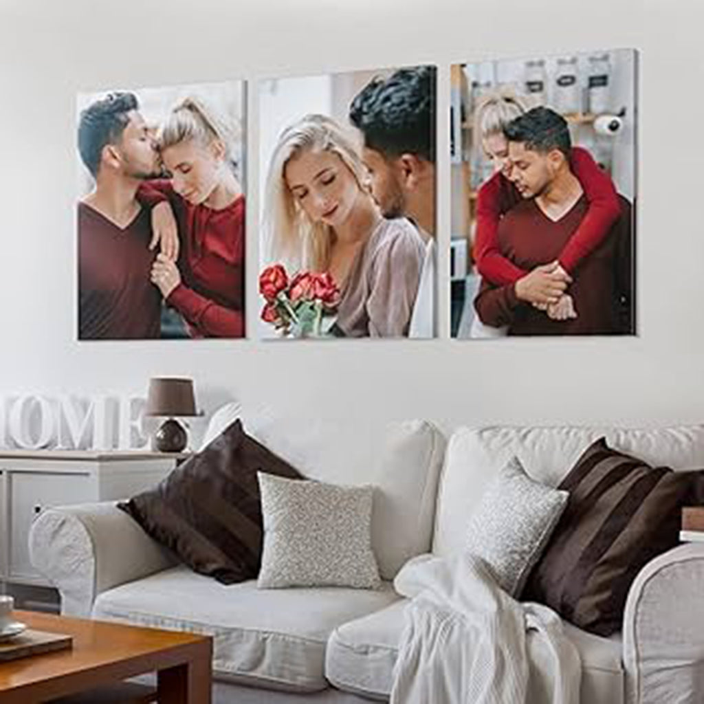 Canvas prints of a Living room with a sofa and decorative pillows, featuring wall art of a couple.