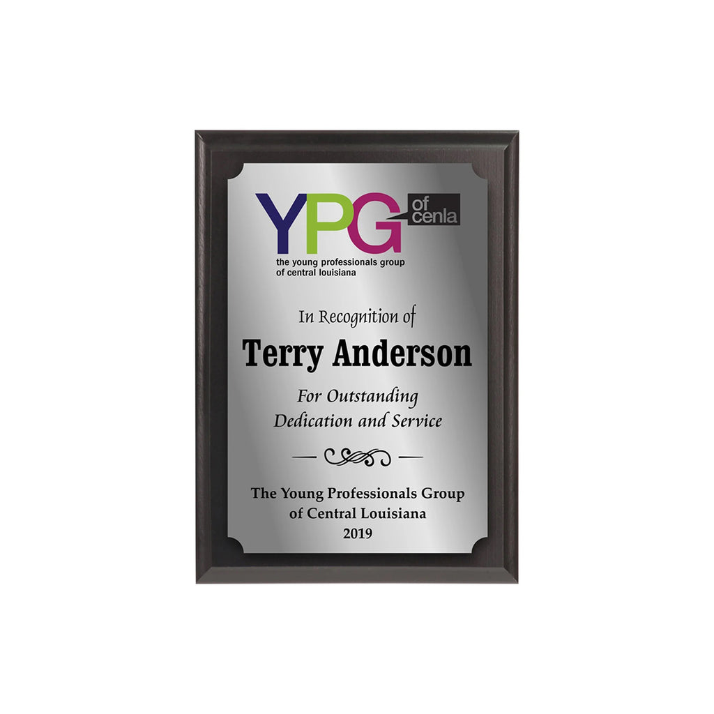 Plaque recognizing Terry Anderson for outstanding dedication and service by YPG of Central Louisiana